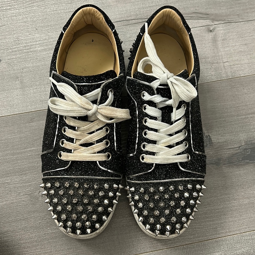 Christian Louboutin Sparkly Sneakers with spikes.